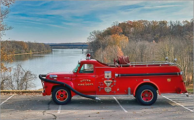 Fire Truck with river in background Lick Creek Walking Trail
