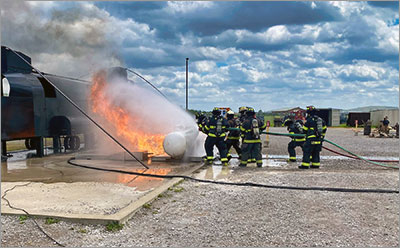 Fire Fighters fighting fire Boat ramp